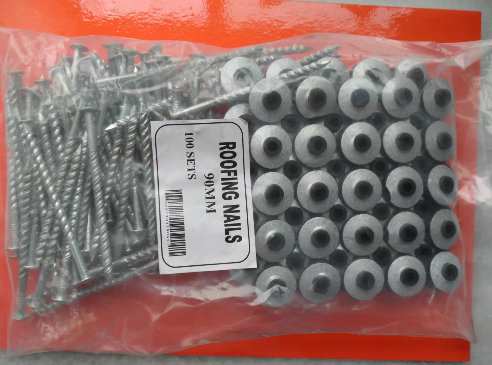 Plastic bag packaging of umbrella roofing nails 90mm, 100 sets per pack, ready for shipment.