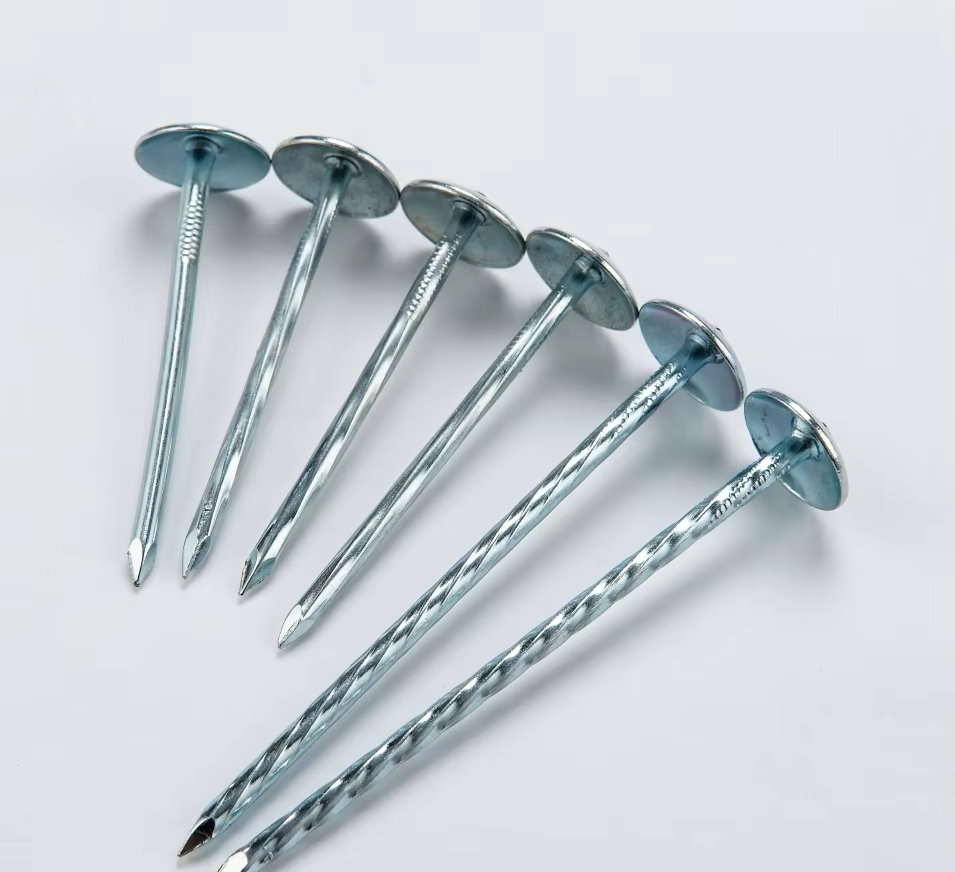 Umbrella roofing nails with wide head and twisted shank used for roofing installation.